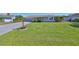 Charming single-story home with a well-maintained lawn and a two car garage with driveway at 607 Fox Hills Dr, Sun City Center, FL 33573