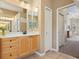 Bathroom featuring a vanity, and doorway to an adjoining room at 6109 Kingbird Manor Dr, Lithia, FL 33547