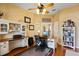 Spacious home office with desk, bookshelves, and natural light at 6109 Kingbird Manor Dr, Lithia, FL 33547