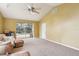 Open living room leads to a view of the pool at 6109 Kingbird Manor Dr, Lithia, FL 33547