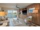Comfortable and stylish living area with a view to the water, featuring neutral colors at 7300 Sun Island S Dr # 202, South Pasadena, FL 33707
