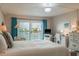 Light and airy main bedroom with balcony overlooking scenic waterfront views at 7300 Sun Island S Dr # 202, South Pasadena, FL 33707
