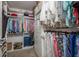 Spacious walk-in closet with custom shelving and ample storage space at 7300 Sun Island S Dr # 202, South Pasadena, FL 33707