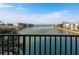 Beautiful water view from the balcony, showcasing the scenic waterfront and nearby buildings at 7300 Sun Island S Dr # 202, South Pasadena, FL 33707