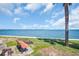 Bench overlooking a peaceful bay with clear blue skies and calm waters at 7550 Sunshine Skyway S Ln # P11, St Petersburg, FL 33711