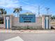 Welcome to Carriage Pointe, a deed-restricted community. Landscaped entrance with stone accents at 7924 Carriage Pointe Dr, Gibsonton, FL 33534