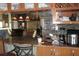 Kitchen area with granite countertops, wooden cabinets, and a view of the living space at 8609 Thimbleberry Ln, Tampa, FL 33635