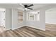 Cozy dining area with lots of natural light and new flooring, perfect for Gathering meals at 9216 Mark Twain Ln, Port Richey, FL 34668
