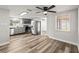 Living room and newly renovated kitchen with modern appliances at 9216 Mark Twain Ln, Port Richey, FL 34668