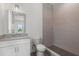 Modern bathroom featuring sleek shower, vanity, and tile work at 109 Punta Vista Dr, St Pete Beach, FL 33706