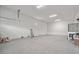 Spacious and bright garage with concrete floors and plenty of room for storage and vehicles at 109 Punta Vista Dr, St Pete Beach, FL 33706
