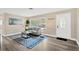 Cozy living room with a stylish rug, comfortable sofa, and plenty of natural light at 11361 88Th Ave, Seminole, FL 33772
