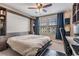A bedroom with built-in shelving and a murphy bed at 11602 Crowned Sparrow Ln, Tampa, FL 33626