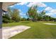 Expansive backyard with mature trees and plenty of green space at 12006 Glenshire Dr, Riverview, FL 33579
