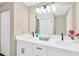 Well-lit bathroom with double vanity, and modern fixtures at 12006 Glenshire Dr, Riverview, FL 33579