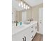 Bathroom with double sink vanity, sleek countertops, and modern fixtures, providing a luxurious feel at 12006 Glenshire Dr, Riverview, FL 33579