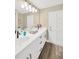 Modern bathroom with double sink vanity and stylish fixtures at 12006 Glenshire Dr, Riverview, FL 33579