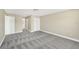 Large bedroom with closet and neutral carpeting at 12006 Glenshire Dr, Riverview, FL 33579