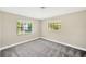 Bright bedroom featuring neutral walls and new carpeting at 12006 Glenshire Dr, Riverview, FL 33579