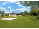 Charming single-Gathering home with a well-manicured lawn and a welcoming curb appeal in a peaceful neighborhood at 12006 Glenshire Dr, Riverview, FL 33579