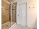 Shower is well-appointed with tiled walls at 1218 Halapa Way, Trinity, FL 34655