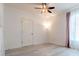 Light filled bedroom with wood-look floors and a full-length window at 1218 Halapa Way, Trinity, FL 34655