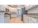 Updated kitchen with stainless steel appliances and granite countertops at 1218 Halapa Way, Trinity, FL 34655