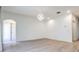 Spacious living room with modern flooring, recessed lights, and neutral walls at 1218 Halapa Way, Trinity, FL 34655