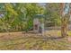 Backyard playset complete with a slide and swings, ready for outdoor adventures at 1218 Halapa Way, Trinity, FL 34655
