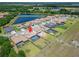 Aerial view of a new home with a pool in a beautiful neighborhood at 14239 Swiss Bridge Dr, Riverview, FL 33579