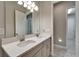 Elegant bathroom with double vanity and tile flooring at 14239 Swiss Bridge Dr, Riverview, FL 33579