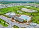 Aerial view of a community with an amazing resort-style pool and clubhouse at 14239 Swiss Bridge Dr, Riverview, FL 33579
