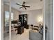 Modern home office with sleek furniture, shelving, and comfortable seating for productive work at 14239 Swiss Bridge Dr, Riverview, FL 33579