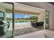 Covered lanai showcases an inviting pool, screened enclosure, and outdoor dining area at 14239 Swiss Bridge Dr, Riverview, FL 33579