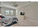 Bedroom showcasing carpet, a dresser, neutral paint and ceiling fan at 14239 Swiss Bridge Dr, Riverview, FL 33579