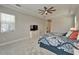 Bedroom featuring carpet, neutral paint, a ceiling fan, and a dresser at 14239 Swiss Bridge Dr, Riverview, FL 33579