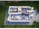 Detailed floor plan showcasing a four-car garage and an inviting living area with stylish decor at 1745 Massachusetts Ne Ave, St Petersburg, FL 33703