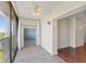 Balcony with ceiling fan, sliding glass door access, and views of the surrounding cityscape at 2403 S Ardson Pl # 902B, Tampa, FL 33629