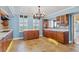 Bright kitchen with wood cabinets, white countertops, and modern stainless steel appliances at 2403 S Ardson Pl # 902B, Tampa, FL 33629