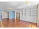 Bright living room features hardwood floors and custom built-ins providing ample space for living at 2403 S Ardson Pl # 902B, Tampa, FL 33629