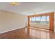 Bright living room featuring hardwood floors and large windows with water views at 2403 S Ardson Pl # 902B, Tampa, FL 33629