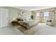 Tranquil bedroom with scenic view, floral curtains, and a comforting rug area at 2403 S Ardson Pl # 902B, Tampa, FL 33629