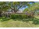 Howell Park signage with mature trees and lush landscaping against a blue sky backdrop at 2403 S Ardson Pl # 902B, Tampa, FL 33629