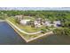 Beautiful aerial view of a park with a splashpad, parking and sidewalks along the waterfront at 2408 Linsey St, Tampa, FL 33605