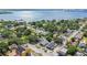 Aerial view of a residential neighborhood near the water, with mature trees and charming homes at 2408 Linsey St, Tampa, FL 33605