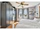 Cozy bedroom with a comfortable bed, natural light from the windows, and a spacious wardrobe providing ample storage at 2408 Linsey St, Tampa, FL 33605