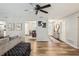 Open-concept living area flows into the dining room, providing a great space for entertaining and everyday living at 2853 Enisgrove Dr, Palm Harbor, FL 34683