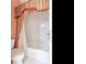 Clean bathroom featuring a white toilet, a white bathtub, and stylish curtains at 2927 W Bayshore Ct, Tampa, FL 33611