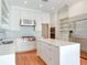 Modern kitchen with stainless steel appliances, white cabinets, and a center island at 2927 W Bayshore Ct, Tampa, FL 33611