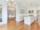 Open-concept kitchen features an island, modern appliances, and seamlessly connects to the living space at 2927 W Bayshore Ct, Tampa, FL 33611